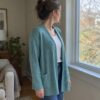 Aqua merino wool jersey fabric, sewn into a cardigan