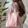 Tote bag sewn in pale pink canvas fabric (AI-generated illustration)