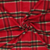 Detail of woven wool blend in red tartan checks