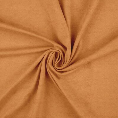 Faux suede in cognac laid in soft folds