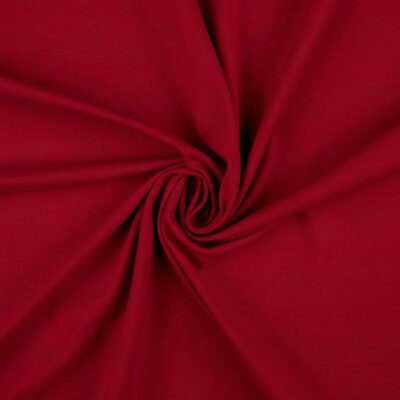Faux suede in red laid in soft folds