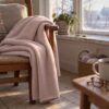 Throw blanket sewn from nude lambskin fleece (AI mockup)