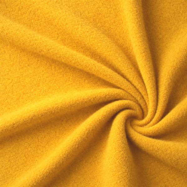 Ochre lambskin fleece in 100% polyester, 240 g/m²