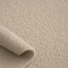 Close-up of the surface of sand lambskin fleece