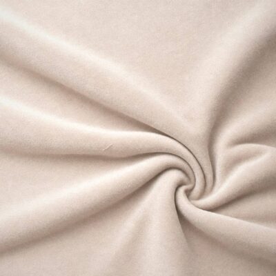 Verhoiluveluuri vaalea beige pehmeillä laskoksilla