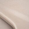 Lähikuva nukasta, verhoiluveluuri vaalea beige
