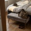 Bench upholstered in mid grey upholstery velour (AI-generated illustration)