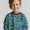 Monster trucks on blue, digital print jersey sewn as a children’s shirt