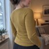 Ochre merino wool jersey, sewn into a long-sleeve top