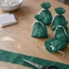 Gift bags sewn from bottle green organza