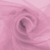 Organza i gammelrosa lagt i bløde folder, let og gennemsigtigt stof