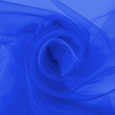 Cobalt blue organza arranged in soft folds, lightweight sheer fabric