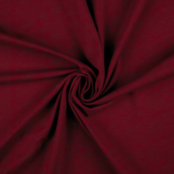 Dark red velour laid in soft folds